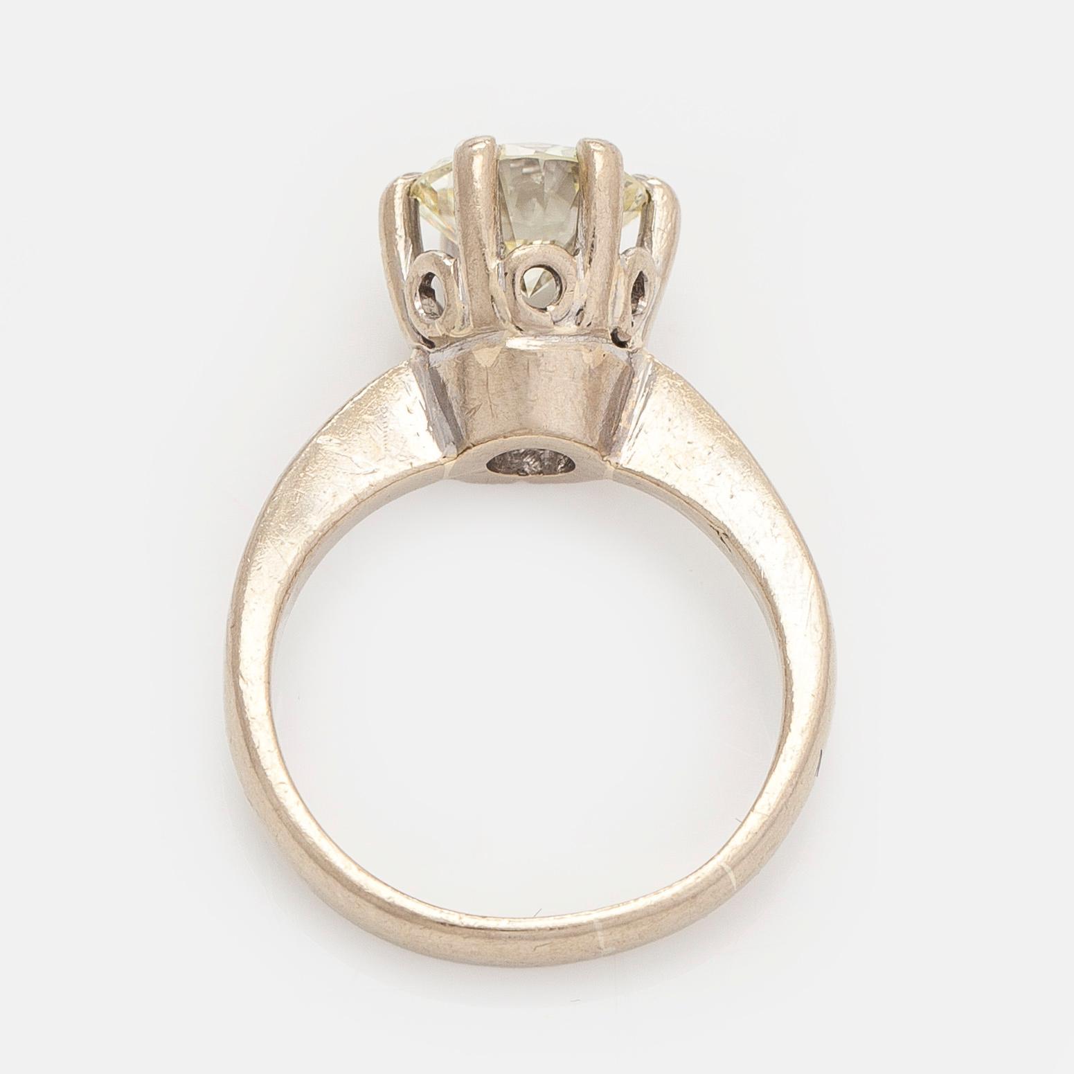 An 18K white gold ring, with a brilliant-cut diamond approximately 1.75 ct. With certificate.