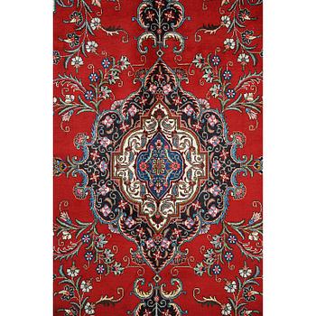 A Tabriz carpet, c 394 x 302 cm.