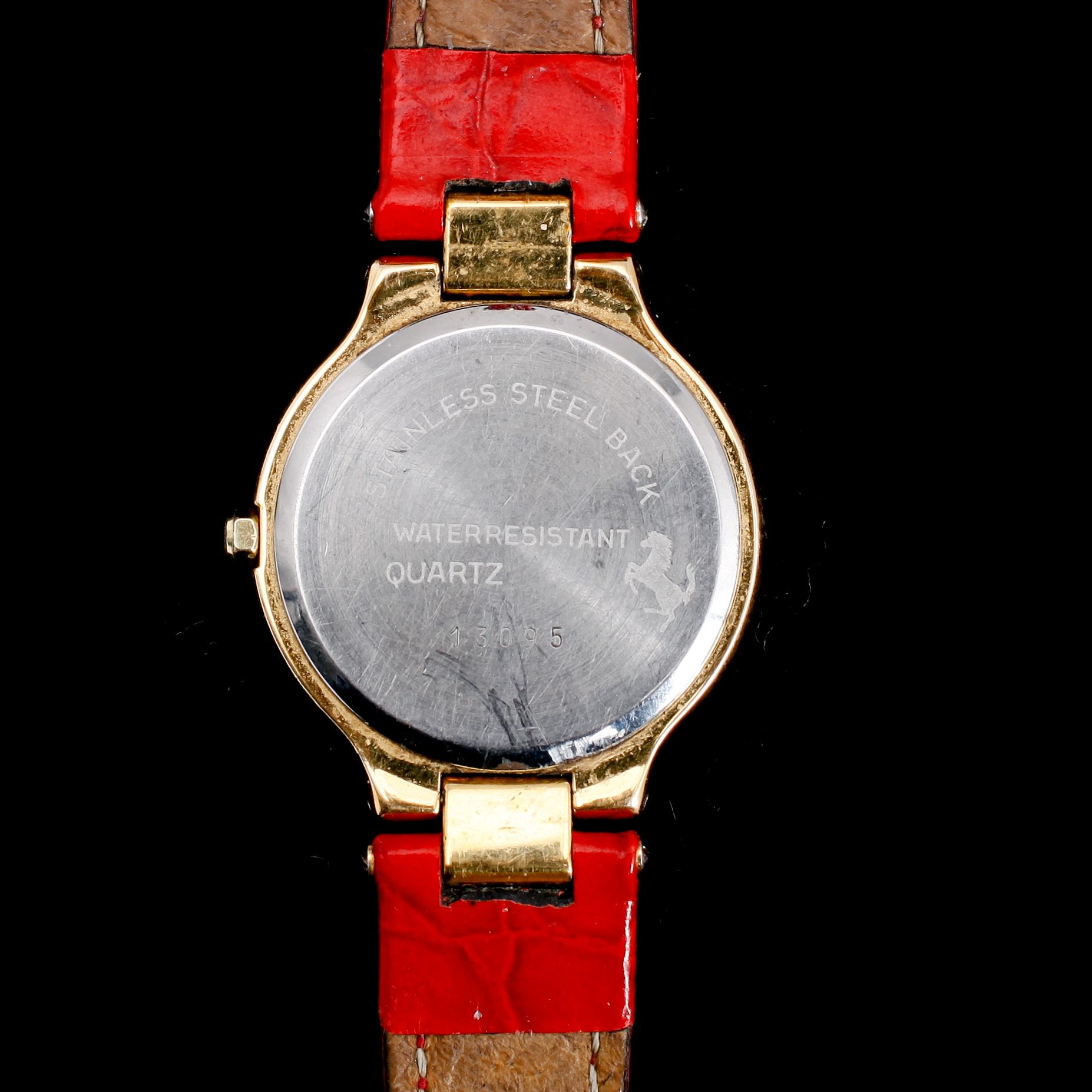 ARMBANDSUR, guld på stål, Ferrari, 1980-tal.