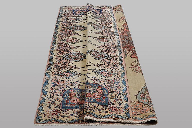 A carpet, old Kerman, ca 370 x 270 cm.
