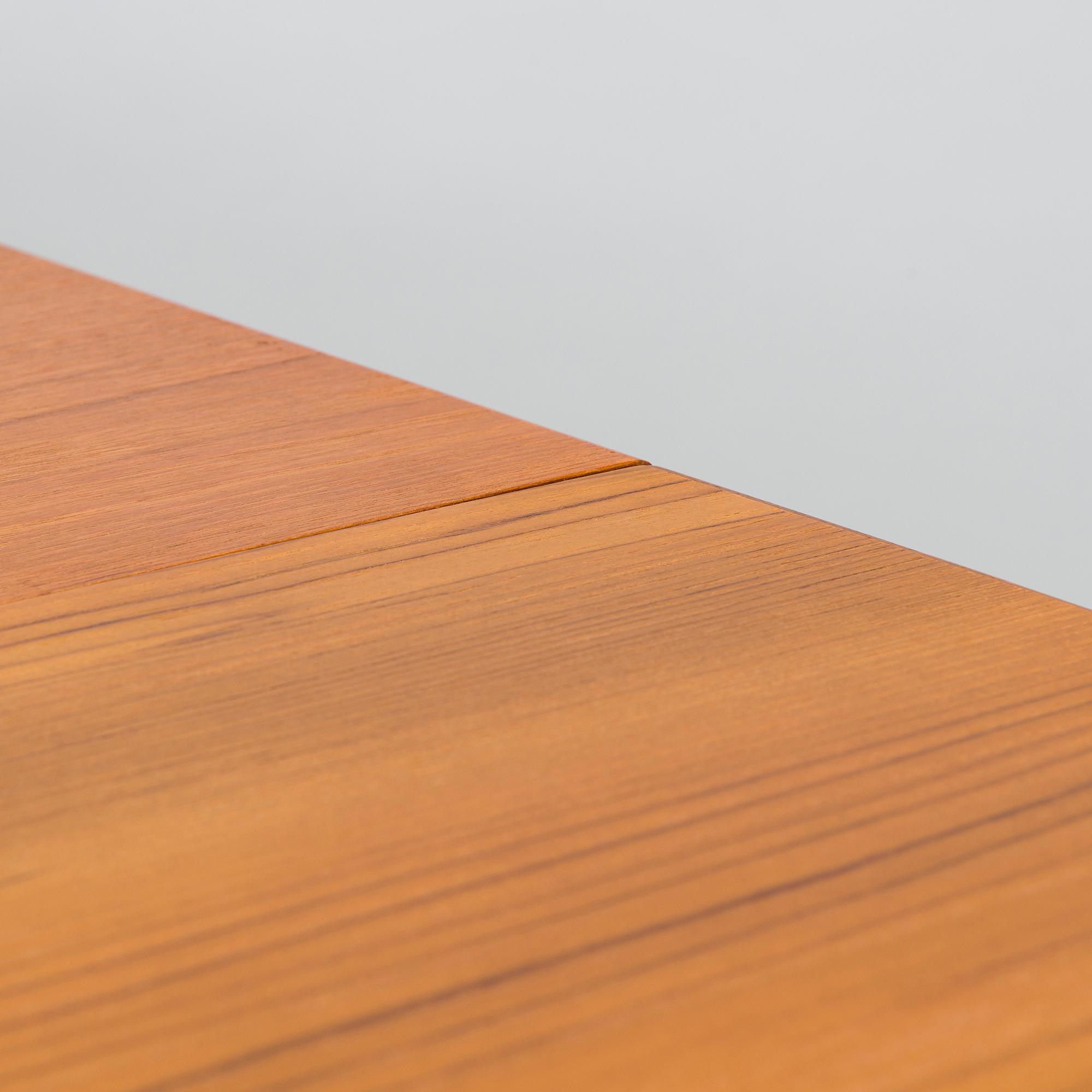 A mid-20th century dining table.