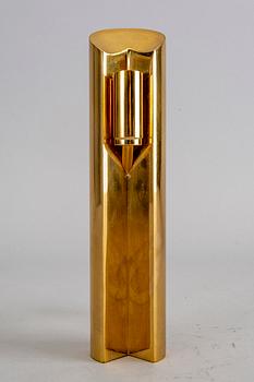 A Pierre Forssell brass candle stick for Skultuna.