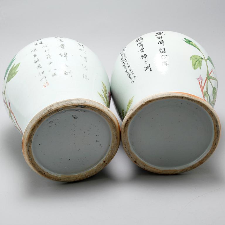 Two similar 20th century porcelain jars with lids.