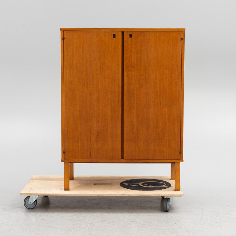 A teak cabinet from Asko, 1950's/60's.