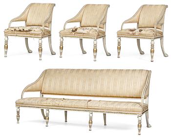 835. A late Gustavian suite of furniture comprising three armchairs and a sofa.