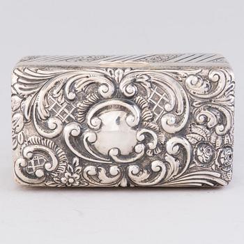 A silver cigar box, mark of A. & J. Zimmerman, Birmingham 1897.