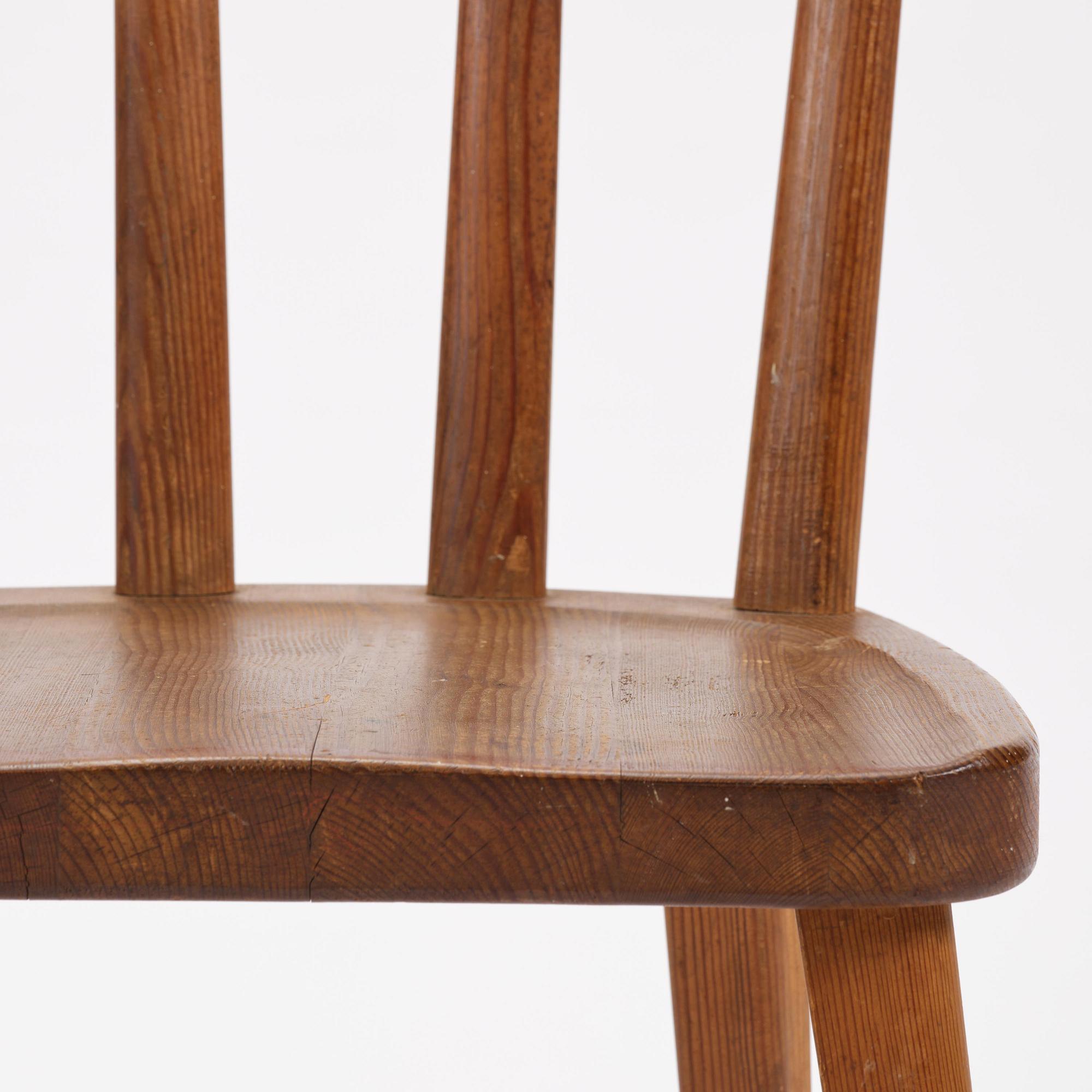 Axel Einar Hjorth, a set of three stained pine "Utö" chairs, Nordiska Kompaniet, Sweden, 1930s.