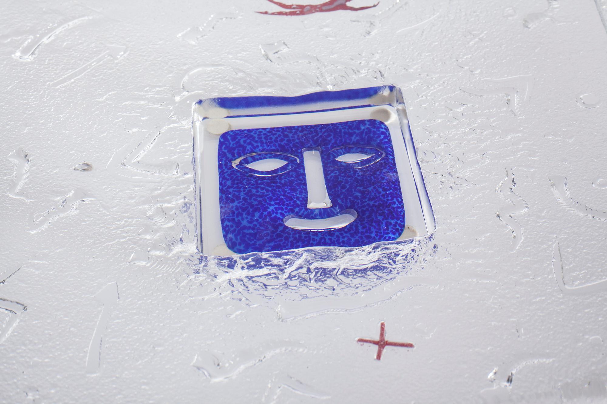 A signed Bertil Vallien glass object for Kosta Boda.