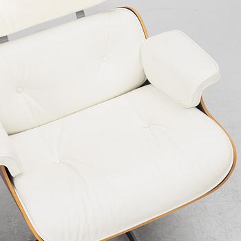 Charles & Ray Eames, fåtölj med fotpall, "Lounge Chair", Vitra, 2008.