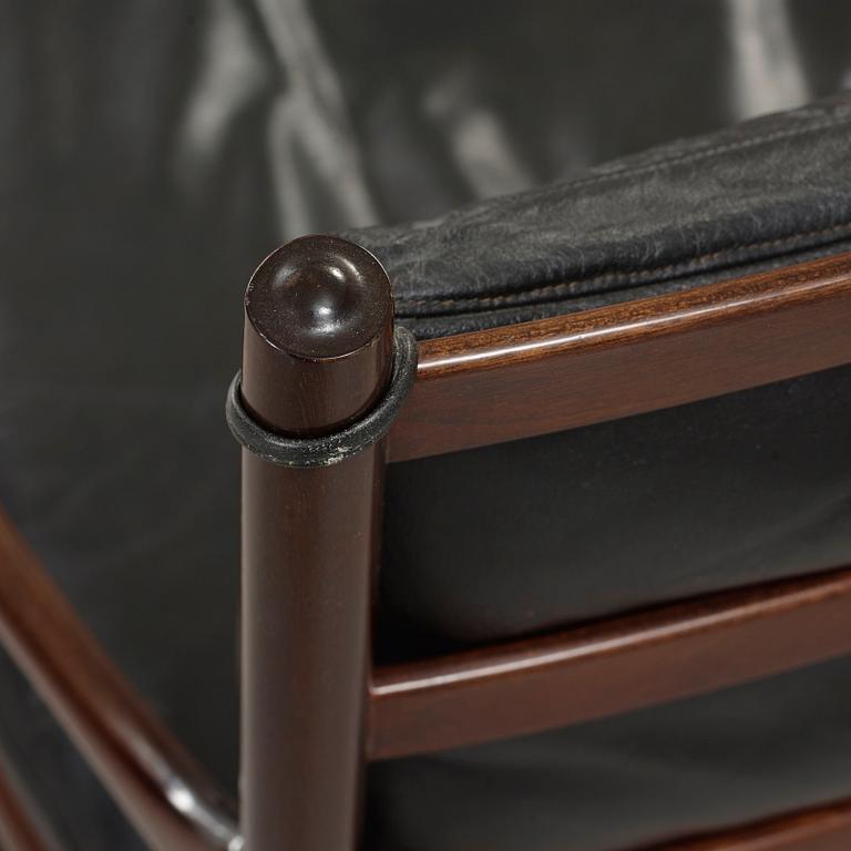 Ole Wanscher, a stained mahogany and black leather 'Colonial Chair PJ 149' and ottoman, Poul Jeppesen, Denmark.