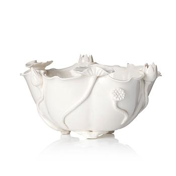 1235. A large dehua/blanc de chine lotus bowl, late Qing dynasty/early 20th century.