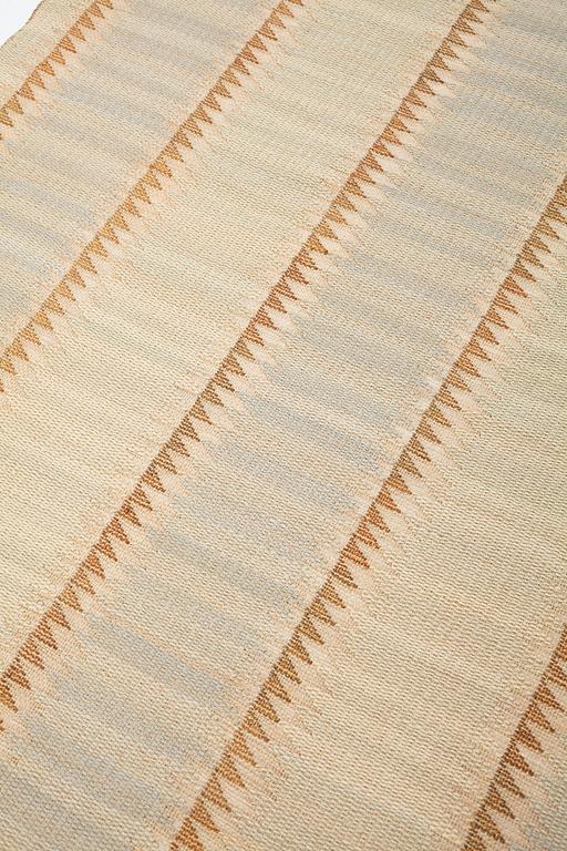 Barbro Nilsson, a textile, "Guldsågen", flat weave, ca 108,5-110 x 72-73 cm, unsigned.