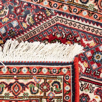 An old Bidjar carpet approx 100x71 cm.