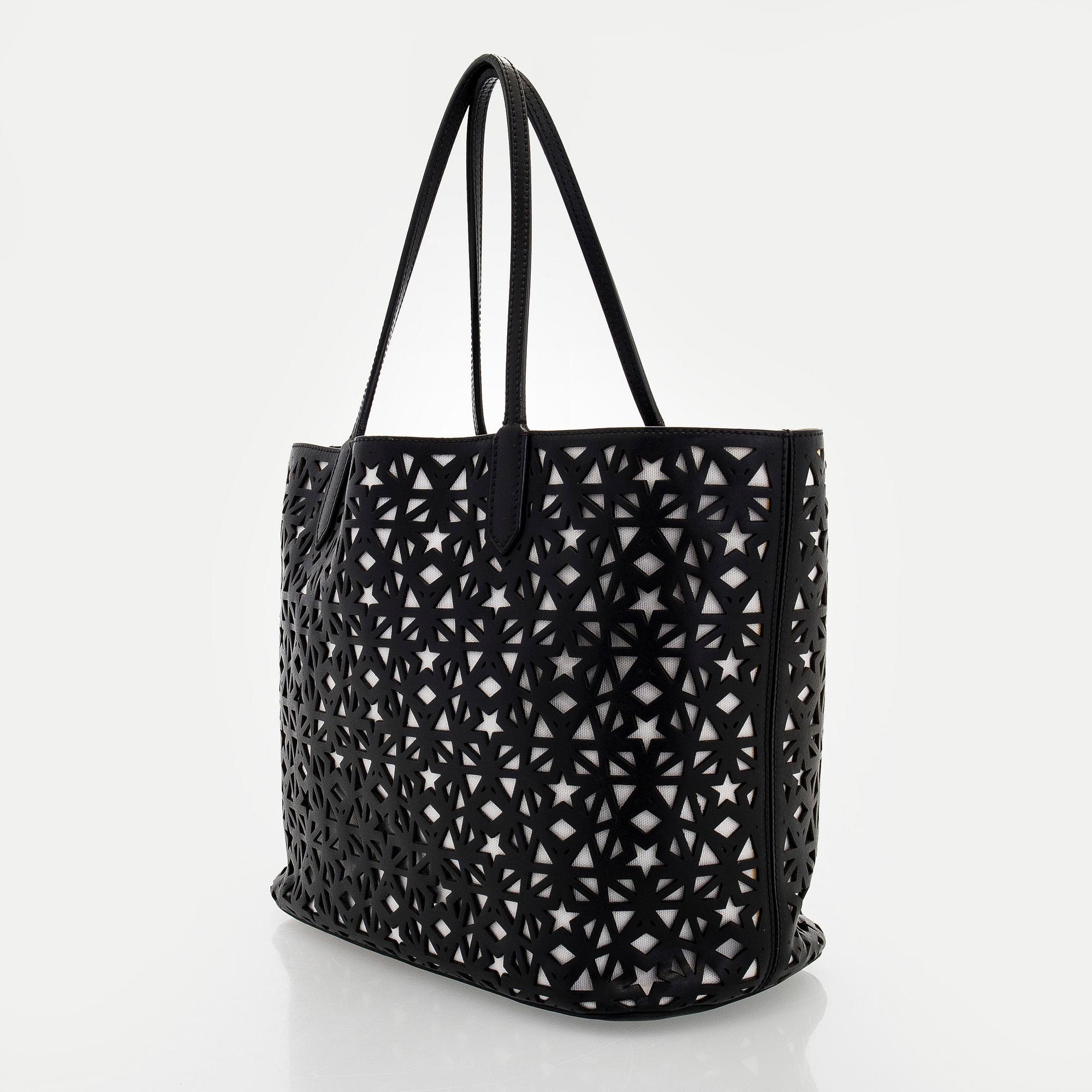 Givenchy, a 'Star Perforated Antigona Shopper' bag.