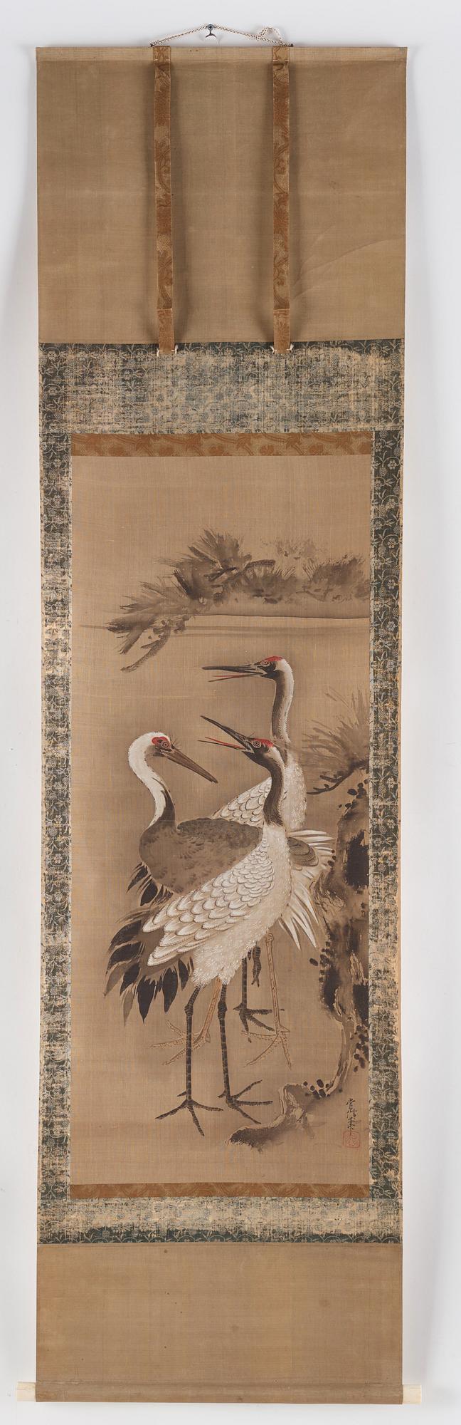A scroll painting with cranes, signed Tsunenobu.