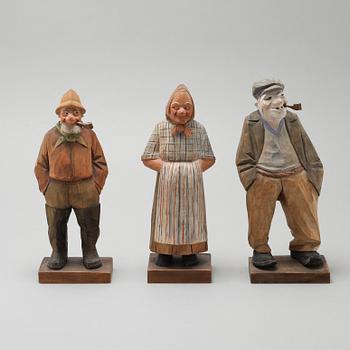 and CARL JOHAN TRYGG, three wooden sculptures, signed and dated, 1940s.
