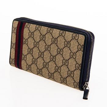 GUCCI Zip Around Long wallet.