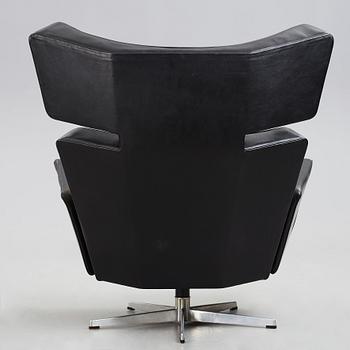 Arne Jacobsen, a black leather and aluminium "Ox-Chair", Denmark 1966.