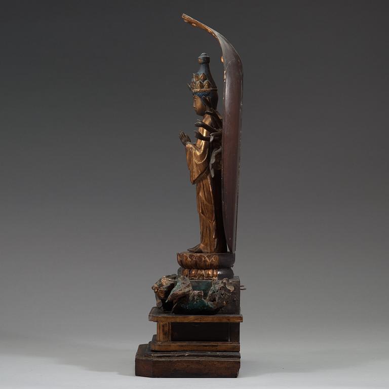 A Japanese wooden sculpture of Bodhisattva Kannon Senju, Edo period, 18th Century.