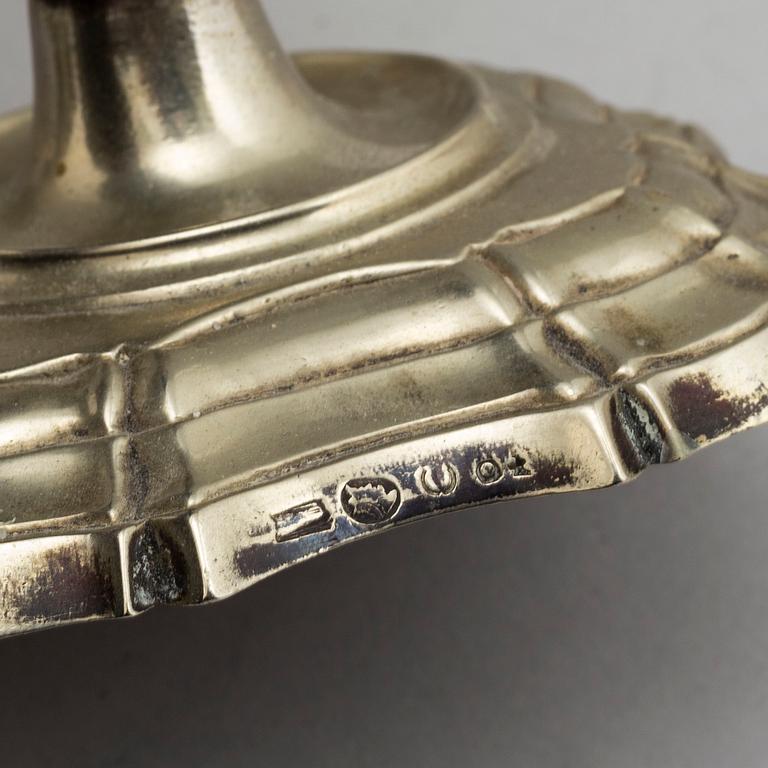 A pair of paktong candlesticks, second half of the 18th century.