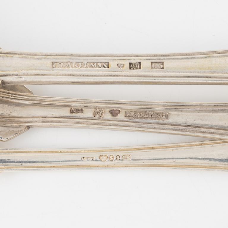 Bestick, 31 st, silver, mestadels CG Hallberg, Stockholm, 1848-1944.