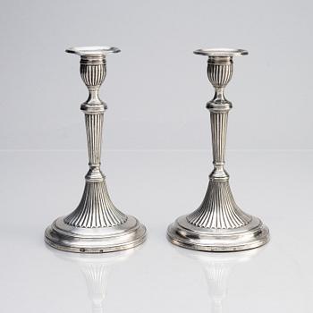 A pair of French 18th century silver candlesticks, unidentified makers mark FG, Dijon.