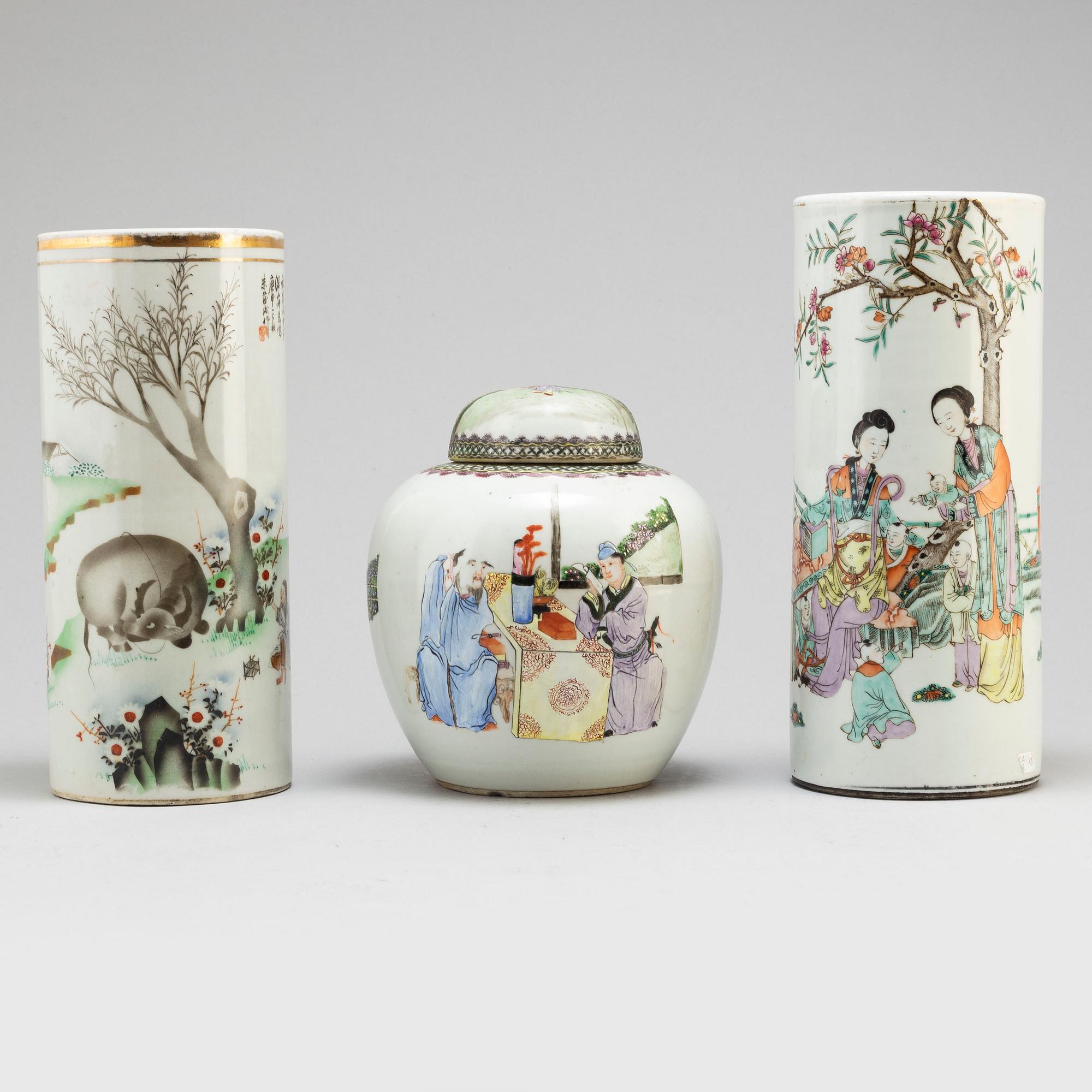 Two Chinese famille rose hat stands and a jar with cover, 20th century.