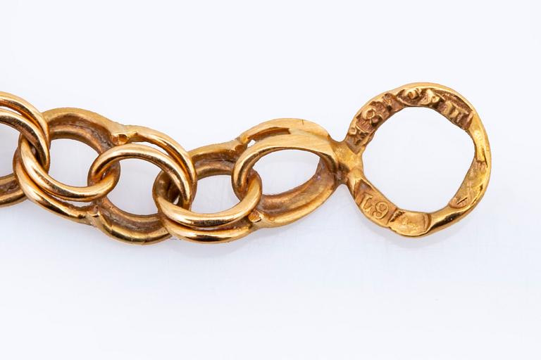 Guldcollier 18K guld, bismarck-länk doserad, ca 43 x 1,5 cm, 15,0 g.