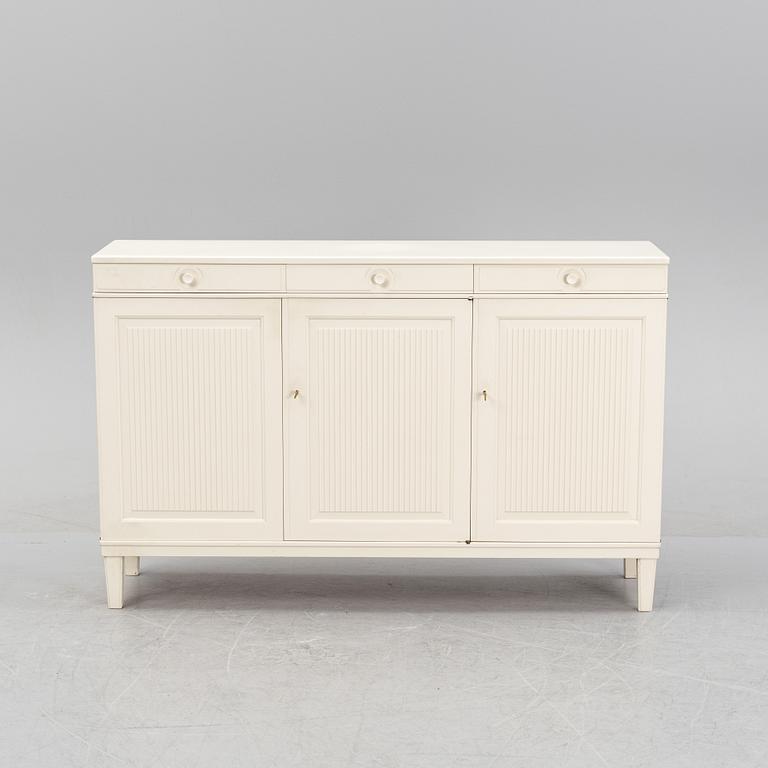 A 'Herrgården' sideboard by Carl Malmsten for Bodafors, dated 1963.