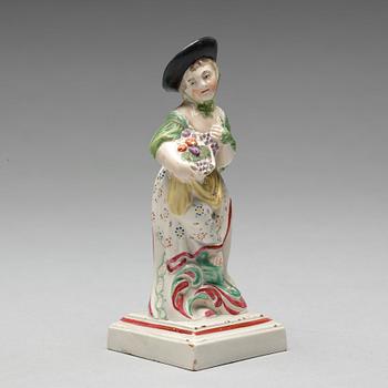 An English creamware figure representing Autumn, circa 1800.