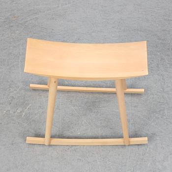 PER SUNDSTEDT, a wood rocking stool from Pyra.