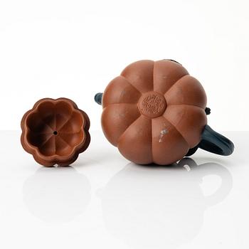 A Chinese yixing 'gourd' teapot, four cups and three saucers, 1980s.