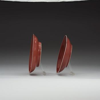 Two 'sang de boef' glazed dishes, Qing dynasty (1644-1912) with Yongzhengs six character mark and Qianlongs seal mark.