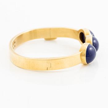 Wiwen Nilsson, a bracelet, 18K gold with lapis lazuli, Lund 1965.