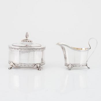 A Swedish silver sugar box and creamer, marks of Jacob Engelberth Torsk, Stockholm 1902.