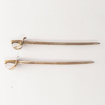 A pair of Swedish cavalry swords 1854 pattern.