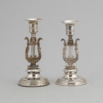 A pair of swedish empire silver candlesticks, Hans Olof Hellbom, Stockholm 1828.