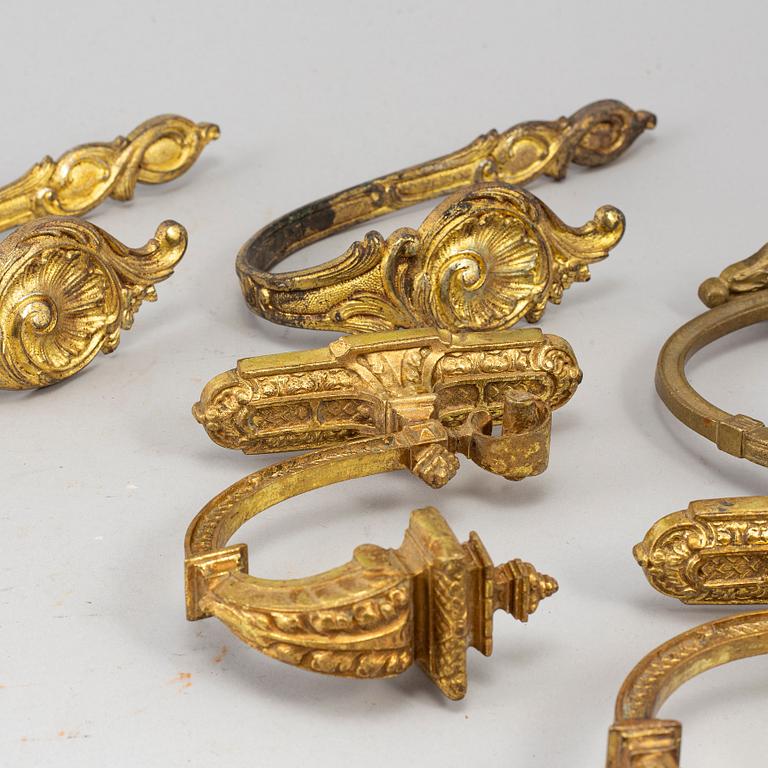 Six ormolu and bronze curtain tie-backs, (2 pairs), 19th century.