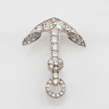 Brooch in the form of an anchor made of 18K white gold with diamonds.