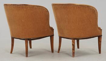 A pair of Nordiska Kompaniet 'Bellman' elm armchairs attributed to Axel Einar Hjorth, Sweden 1929-30.