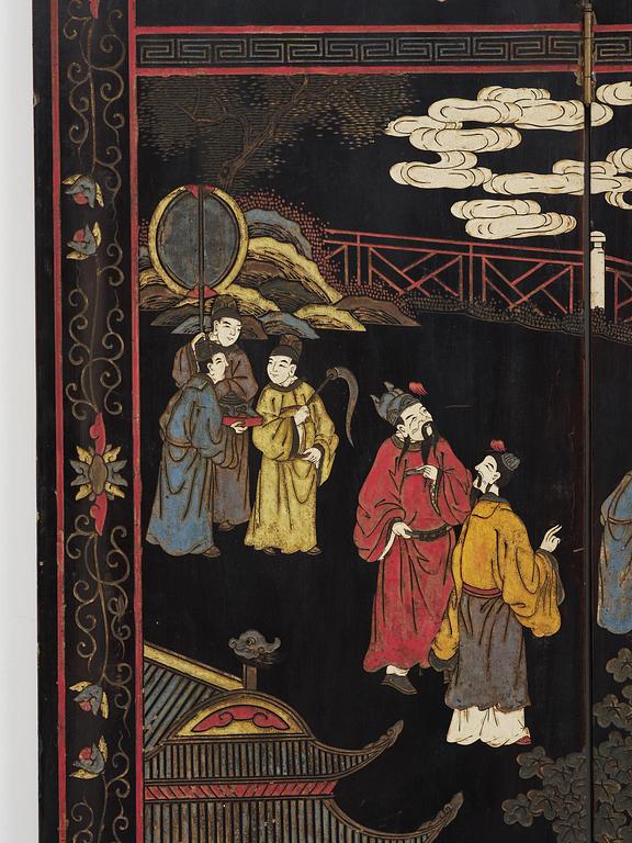 A Chinese four panel lacquer folding screen, first part of the 20th century.