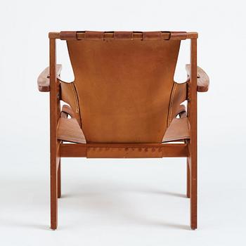 Carl-Axel Acking, a "Trienna" oak and natural leather easy chair, for Nordiska Kompaniet, Sweden 1960's.