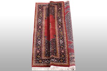 A rug, Tabriz, ca 241 x 167 cm.