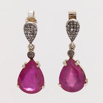 A pair of gilded sterling silver earrings with rubies, rose and brilliant cut diamonds.