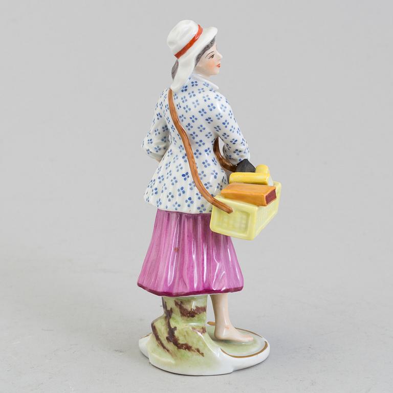 A Ludwigsburg porcelain figure of a street vendor, Germany, 1970's.