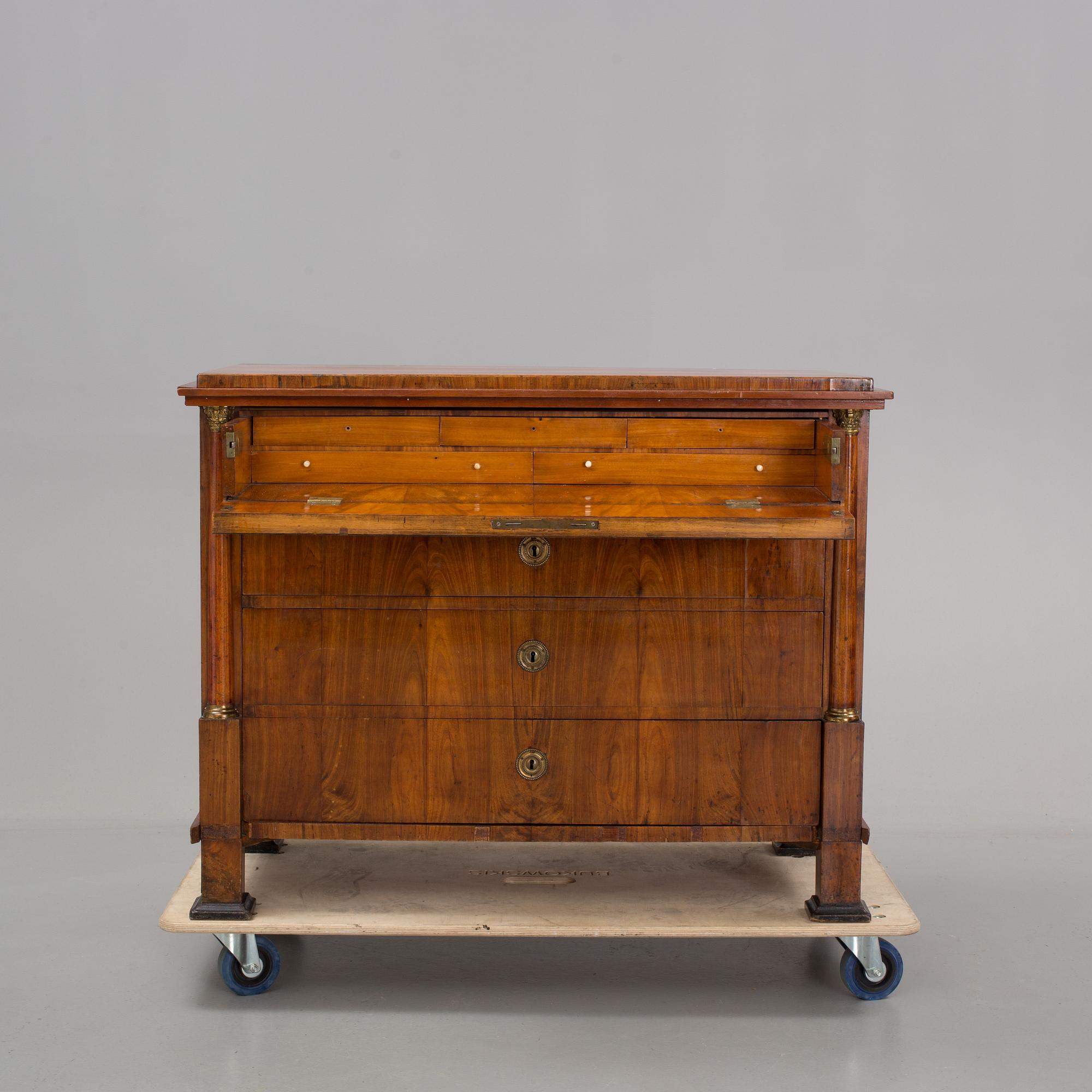 An early 19th century, Empire secretaire cabinet.