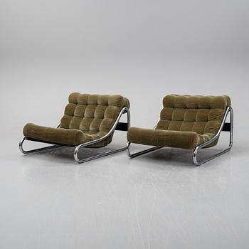 A pair of 'Impala' lounge chairs with table by Gillis Lundgren for IKEA, released 1972.