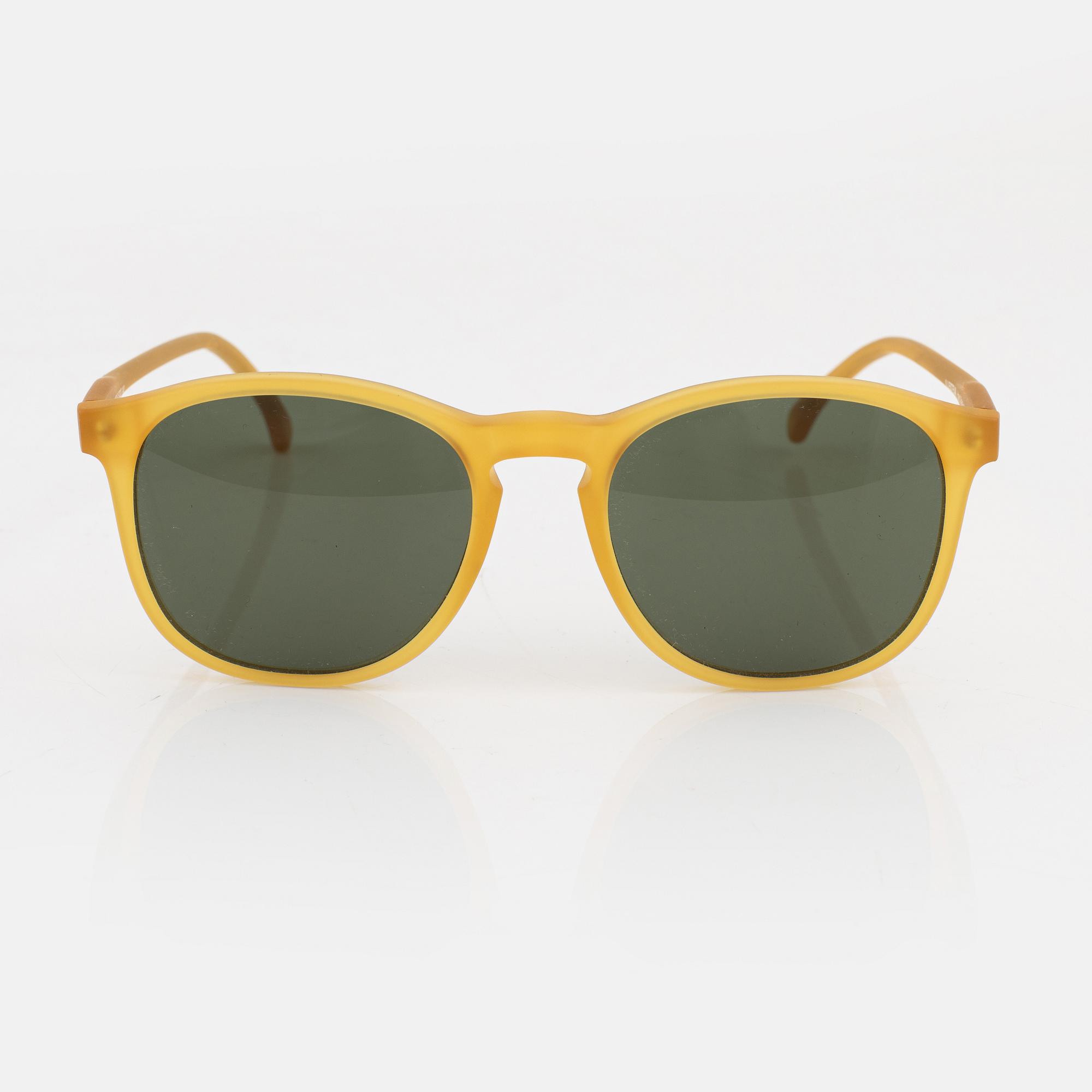 Illesteva, a pair of yellow sunglasses.