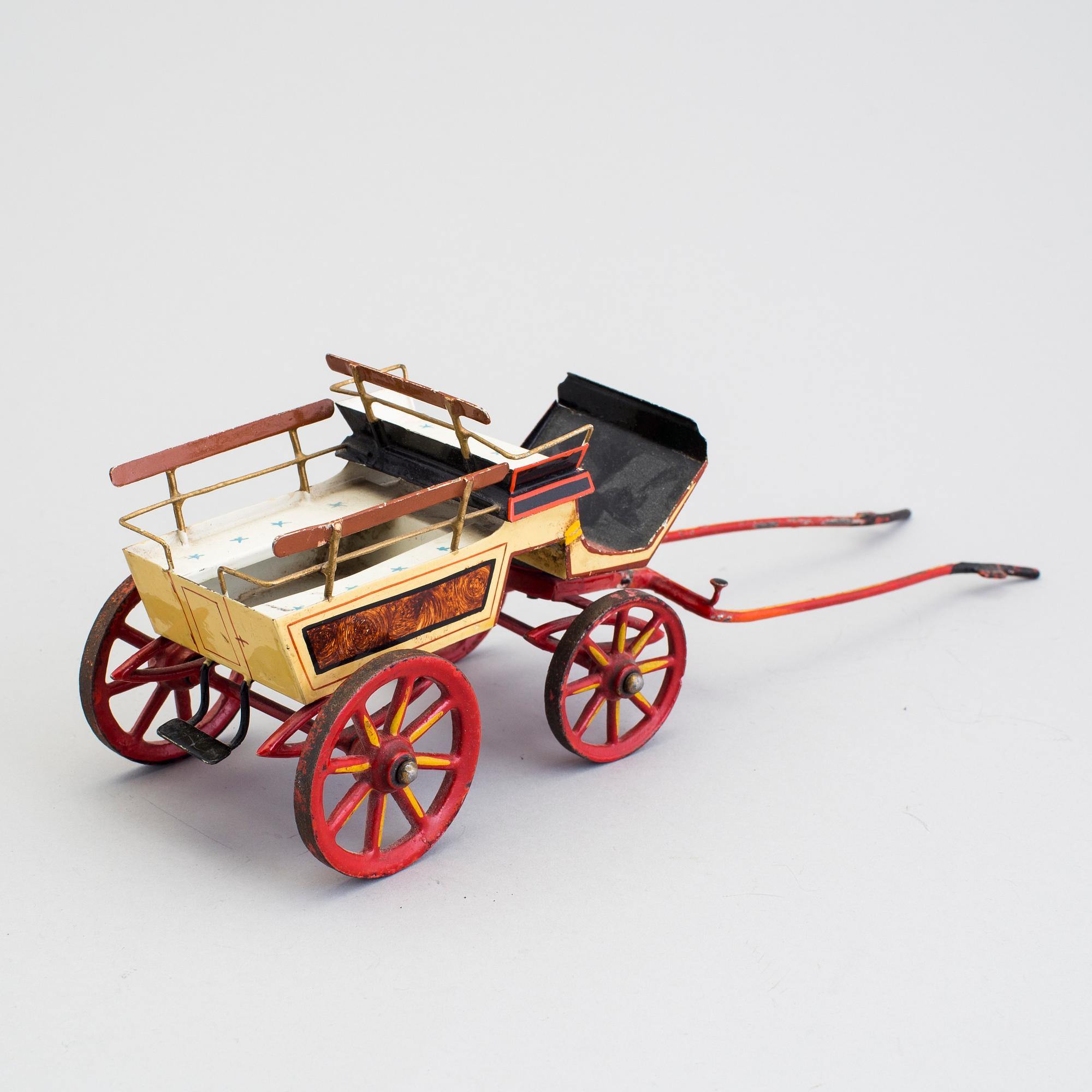 A painted metal horse carriage Germany c 1890-1900.