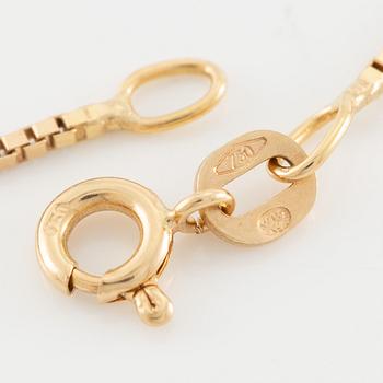 Necklace, gold with grey-toned pearl.